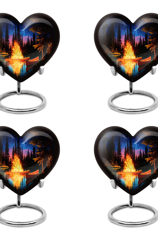 Deep Black Campfire Cremation Urn angled view of lid and engraved motif - heart-shaped campfire design symbolizing eternal love - 10 inch aluminum urn for cremated remains