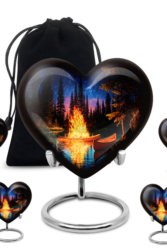 Midnight Black Campfire Cremation Urn close-up of engraving and surface detail - compassionate heart-campfire combination with gentle curves - memorial set with one large and four small urns
