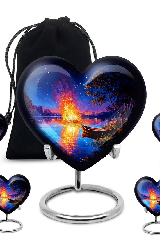 Soft Blue Campfire Cremation Urn close-up of engraving and surface detail - compassionate heart-campfire combination with gentle curves - memorial set with one large and four small urns