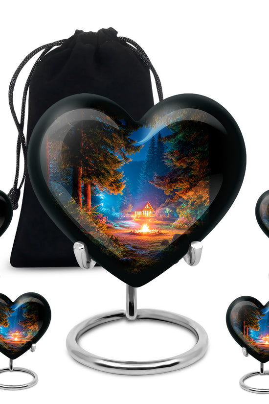 Rich Black Campfire Cremation Urn close-up of engraving and surface detail - heart-shaped campfire design symbolizing eternal love - memorial set with one large and four small urns
