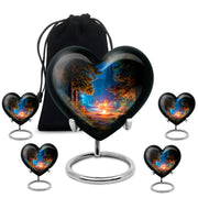 Rich Black Campfire Cremation Urn close-up of engraving and surface detail - heart-shaped campfire design symbolizing eternal love - memorial set with one large and four small urns