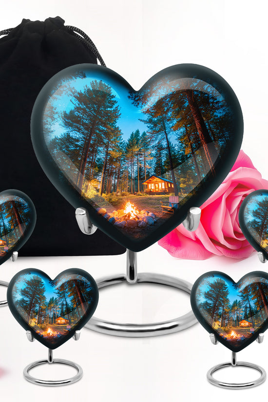 Sapphire Blue Campfire Cremation Urn close-up of engraving and surface detail - romantic heart urn with campfire motif on aluminum - memorial set with one large and four small urns
