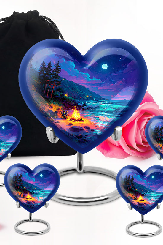 Steel Blue Campfire Cremation Urn close-up of engraving and surface detail - compassionate heart-campfire combination with gentle curves - memorial set with one large and four small urns