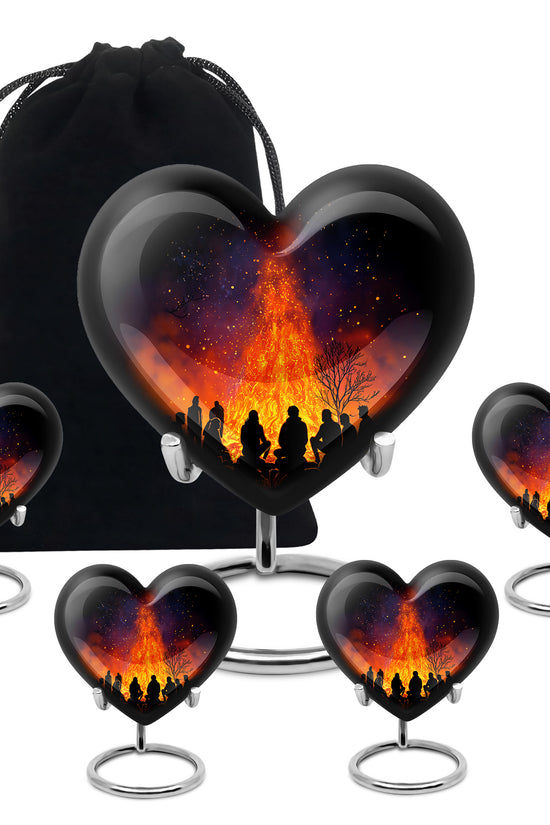 Onyx Black Campfire Cremation Urn close-up of engraving and surface detail - romantic heart urn with campfire motif on aluminum - memorial set with one large and four small urns