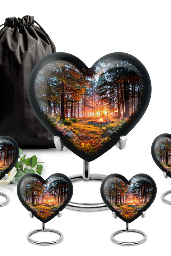 Charcoal Black Campfire Cremation Urn close-up of engraving and surface detail - romantic heart urn with campfire motif on aluminum - memorial set with one large and four small urns