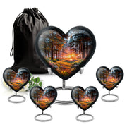 Charcoal Black Campfire Cremation Urn close-up of engraving and surface detail - romantic heart urn with campfire motif on aluminum - memorial set with one large and four small urns