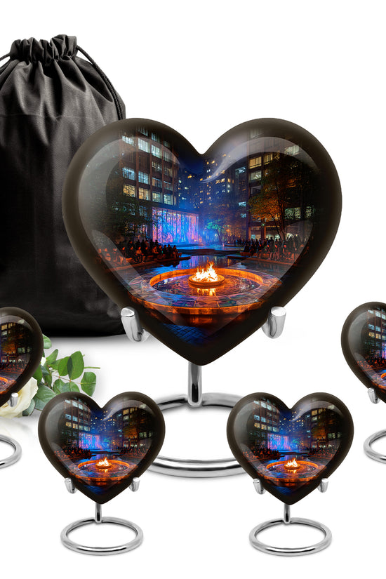 Obsidian Black Campfire Cremation Urn close-up of engraving and surface detail - romantic heart urn with campfire motif on aluminum - memorial set with one large and four small urns