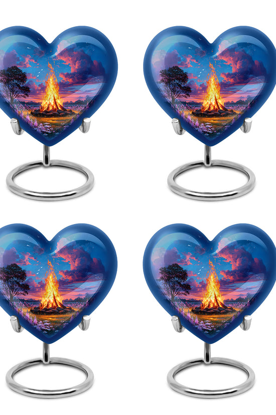 Cornflower Blue Campfire Cremation Urn angled view of lid and engraved motif - compassionate heart-campfire combination with gentle curves - 10 inch aluminum urn for cremated remains