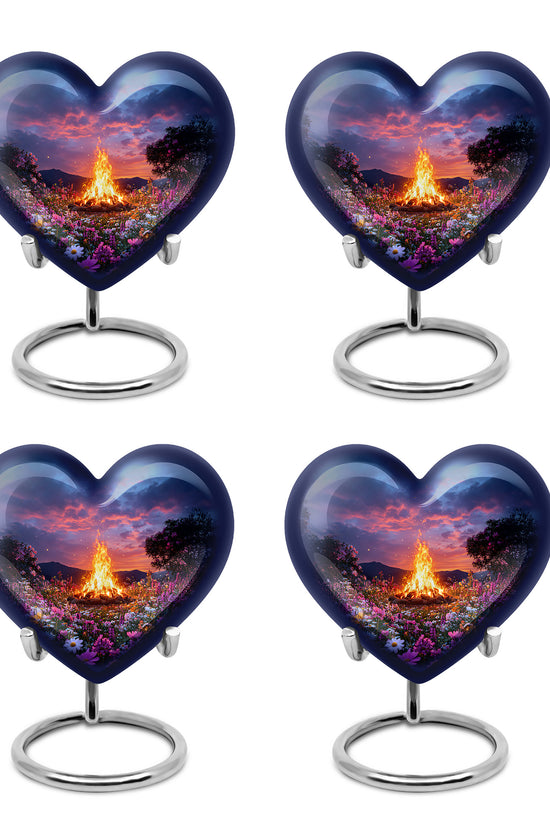 Dusty Blue Campfire Cremation Urn angled view of lid and engraved motif - heart-shaped campfire design symbolizing eternal love - 10 inch aluminum urn for cremated remains