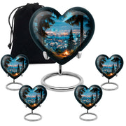 Soft Blue Campfire Cremation Urn close-up of engraving and surface detail - romantic heart urn with campfire motif on aluminum - memorial set with one large and four small urns