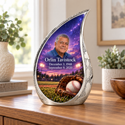 Curved Drop baseball memorial urn in a natural home setting.