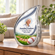 Curved Drop baseball memorial urn in a natural home setting.