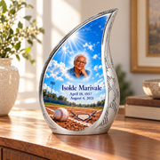 Curved Drop baseball memorial urn in a natural home setting.