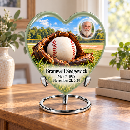 Heart baseball memorial urn in a natural home setting.