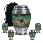 Mint Green Butterfly Cremation Urn detail view - majestic butterfly pattern with filigree border - memorial set with one large and four small urns