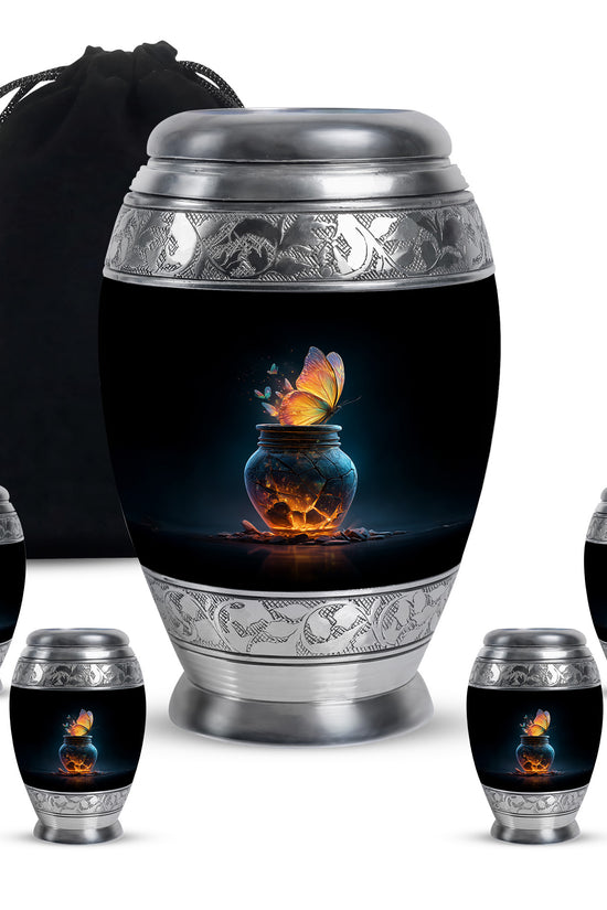 Midnight Black Butterfly Cremation Urn detail view - royal butterfly engraving with decorative scrollwork - memorial set with one large and four small urns