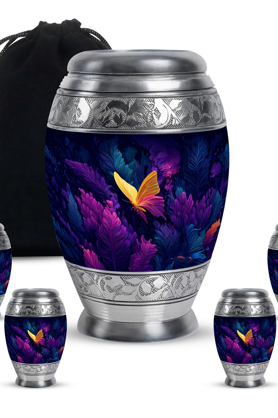 Misty Blue Butterfly Cremation Urn detail view - ornate monarch-style butterfly relief on brushed aluminum - memorial set with one large and four small urns