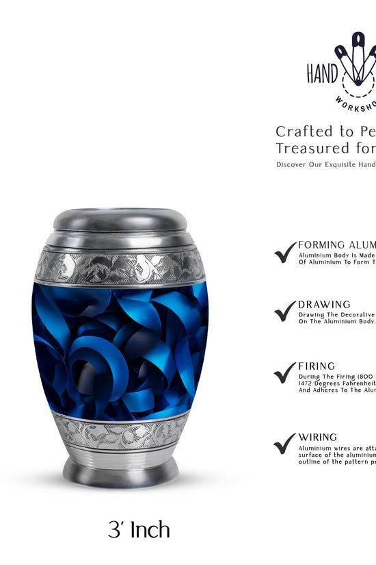 Onyx Black Blue Cremation Urn lifestyle display on memorial shelf - royal blue engraving with decorative scrollwork - mini keepsake memorial for portion of cremation ashes