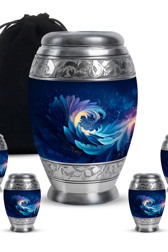 Indigo Blue Cremation Urn detail view - ornate monarch-style blue relief on brushed aluminum - memorial set with one large and four small urns
