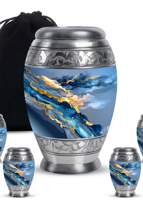 Soft Blue Blue Cremation Urn detail view - majestic blue pattern with filigree border - memorial set with one large and four small urns