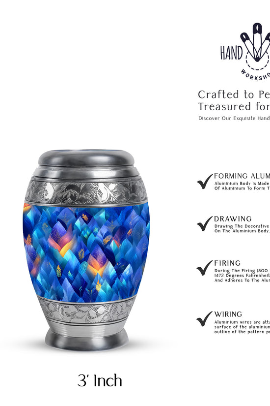 Azure Blue Cremation Urn lifestyle display on memorial shelf - ornate monarch-style blue relief on brushed aluminum - mini keepsake memorial for portion of cremation ashes