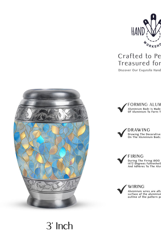 Sky Blue Blue Cremation Urn lifestyle display on memorial shelf - ornate monarch-style blue relief on brushed aluminum - mini keepsake memorial for portion of cremation ashes