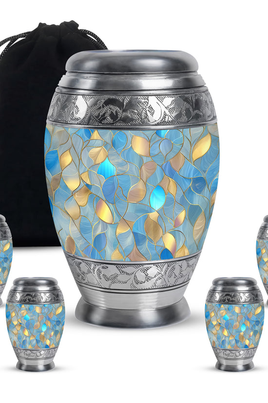 Soft Blue Blue Cremation Urn detail view - majestic blue pattern with filigree border - memorial set with one large and four small urns