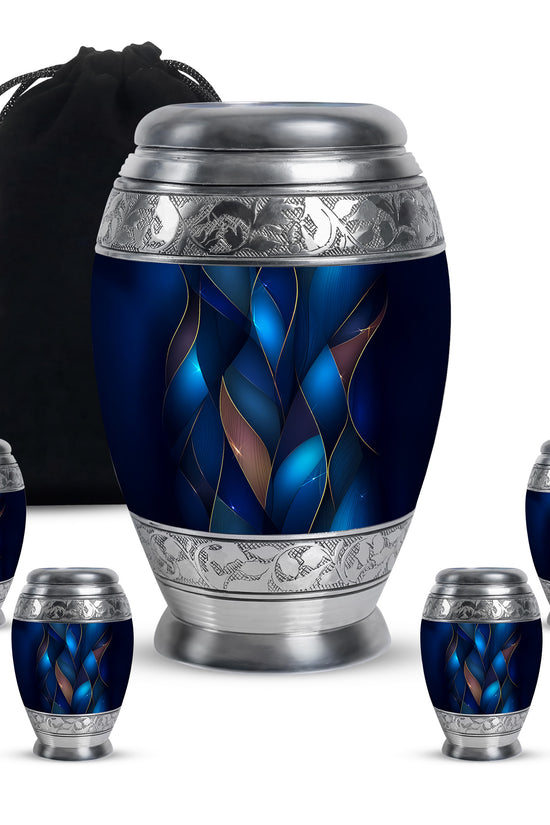 Slate Blue Blue Cremation Urn detail view - ornate monarch-style blue relief on brushed aluminum - memorial set with one large and four small urns