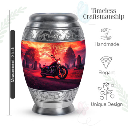 Deep Red Bike Cremation Urn lifestyle display on memorial shelf - ornate monarch-style bike relief on brushed aluminum - mini keepsake memorial for portion of cremation ashes