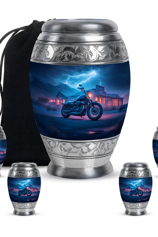 Powder Blue Bike Cremation Urn detail view - ornate monarch-style bike relief on brushed aluminum - memorial set with one large and four small urns