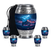 Powder Blue Bike Cremation Urn detail view - ornate monarch-style bike relief on brushed aluminum - memorial set with one large and four small urns