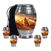 Sunrise Gold Bike Cremation Urn detail view - regal bike design with crown-inspired accents - memorial set with one large and four small urns
