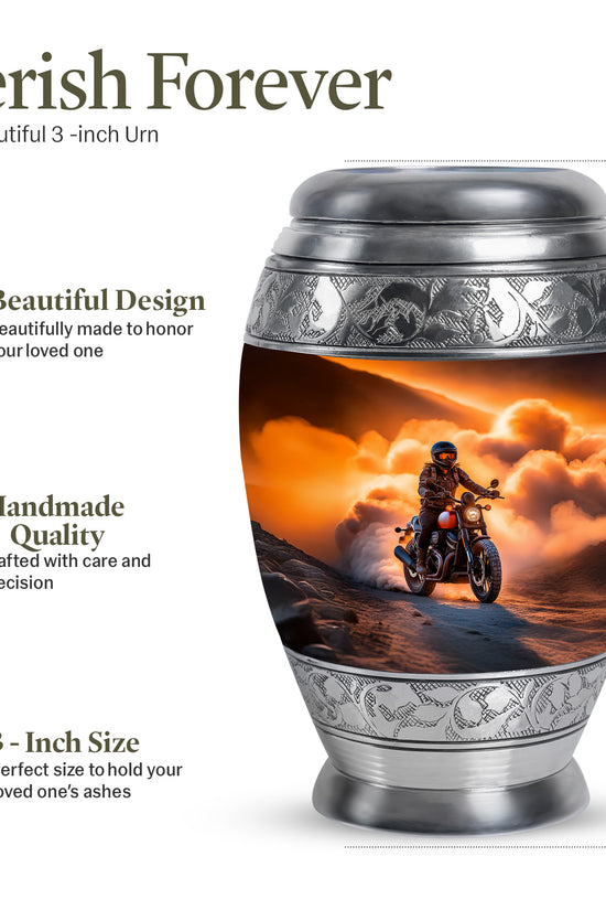 Champagne Gold Bike Cremation Urn lifestyle display on memorial shelf - ornate monarch-style bike relief on brushed aluminum - mini keepsake memorial for portion of cremation ashes