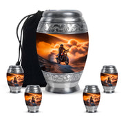 Royal Gold Bike Cremation Urn detail view - royal bike engraving with decorative scrollwork - memorial set with one large and four small urns