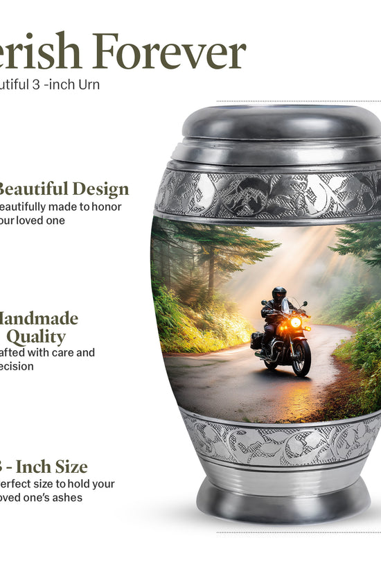 Burnished Gold Bike Cremation Urn lifestyle display on memorial shelf - majestic bike pattern with filigree border - mini keepsake memorial for portion of cremation ashes