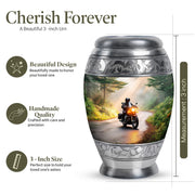 Burnished Gold Bike Cremation Urn lifestyle display on memorial shelf - majestic bike pattern with filigree border - mini keepsake memorial for portion of cremation ashes