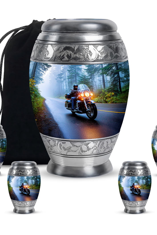 Sapphire Blue Bike Cremation Urn detail view - majestic bike pattern with filigree border - memorial set with one large and four small urns