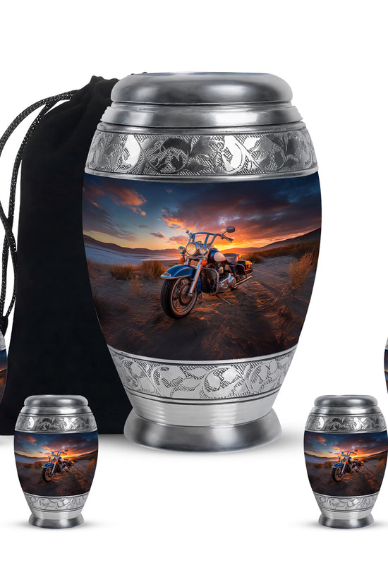 Ebony Bike Cremation Urn detail view - regal bike design with crown-inspired accents - memorial set with one large and four small urns