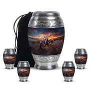 Ebony Bike Cremation Urn detail view - regal bike design with crown-inspired accents - memorial set with one large and four small urns