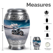 Slate Blue Bike Cremation Urn lifestyle display on memorial shelf - ornate monarch-style bike relief on brushed aluminum - mini keepsake memorial for portion of cremation ashes