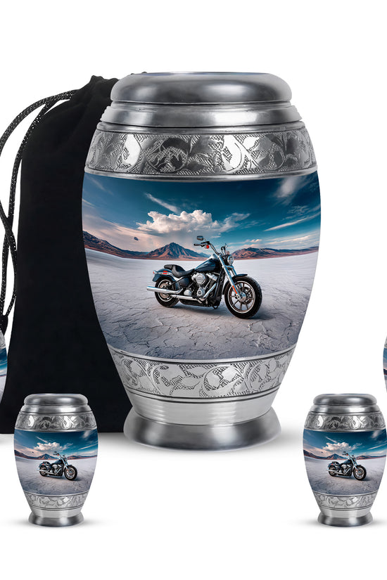 Royal Blue Bike Cremation Urn detail view - majestic bike pattern with filigree border - memorial set with one large and four small urns