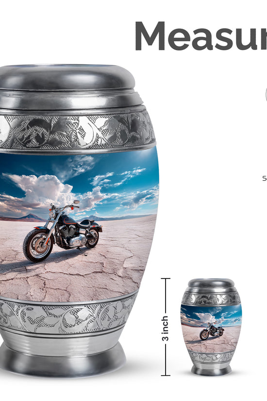 Steel Blue Bike Cremation Urn lifestyle display on memorial shelf - majestic bike pattern with filigree border - mini keepsake memorial for portion of cremation ashes
