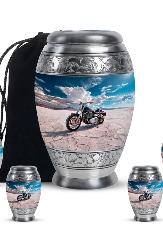 Calming Blue Bike Cremation Urn detail view - royal bike engraving with decorative scrollwork - memorial set with one large and four small urns