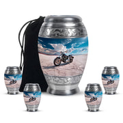 Calming Blue Bike Cremation Urn detail view - royal bike engraving with decorative scrollwork - memorial set with one large and four small urns