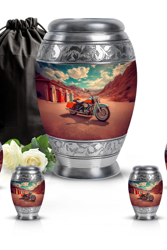 Aqua Teal Bike Cremation Urn detail view - royal bike engraving with decorative scrollwork - memorial set with one large and four small urns