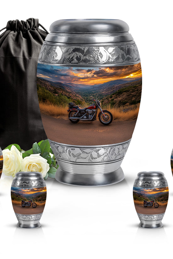 Sapphire Blue Bike Cremation Urn detail view - majestic bike pattern with filigree border - memorial set with one large and four small urns