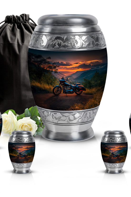 Celestial Blue Bike Cremation Urn detail view - ornate monarch-style bike relief on brushed aluminum - memorial set with one large and four small urns
