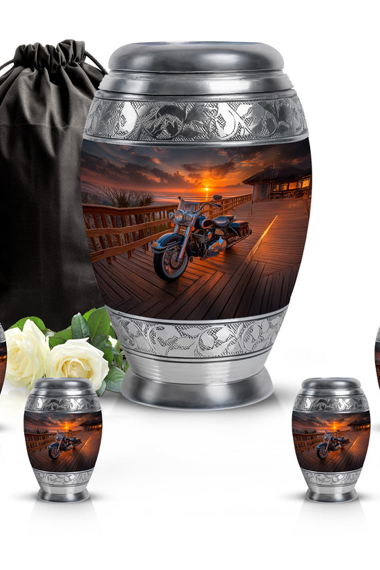 Obsidian Black Bike Cremation Urn detail view - royal bike engraving with decorative scrollwork - memorial set with one large and four small urns