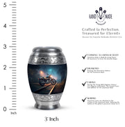 Cobalt Blue Bike Cremation Urn lifestyle display on memorial shelf - royal bike engraving with decorative scrollwork - mini keepsake memorial for portion of cremation ashes
