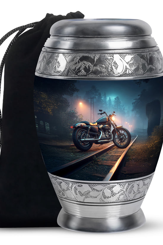 Indigo Bike Cremation Urn back view with polished surface - ornate monarch-style bike relief on brushed aluminum - full-size 10 inch 200 cubic inch adult cremation urn